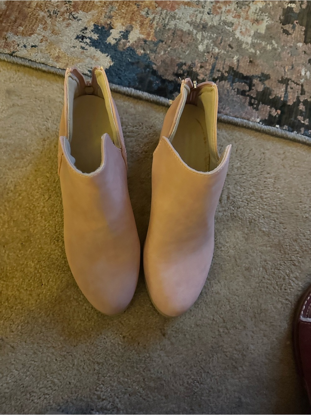 Ankle boots powder pink flat heels zip up back for ease. Never worn